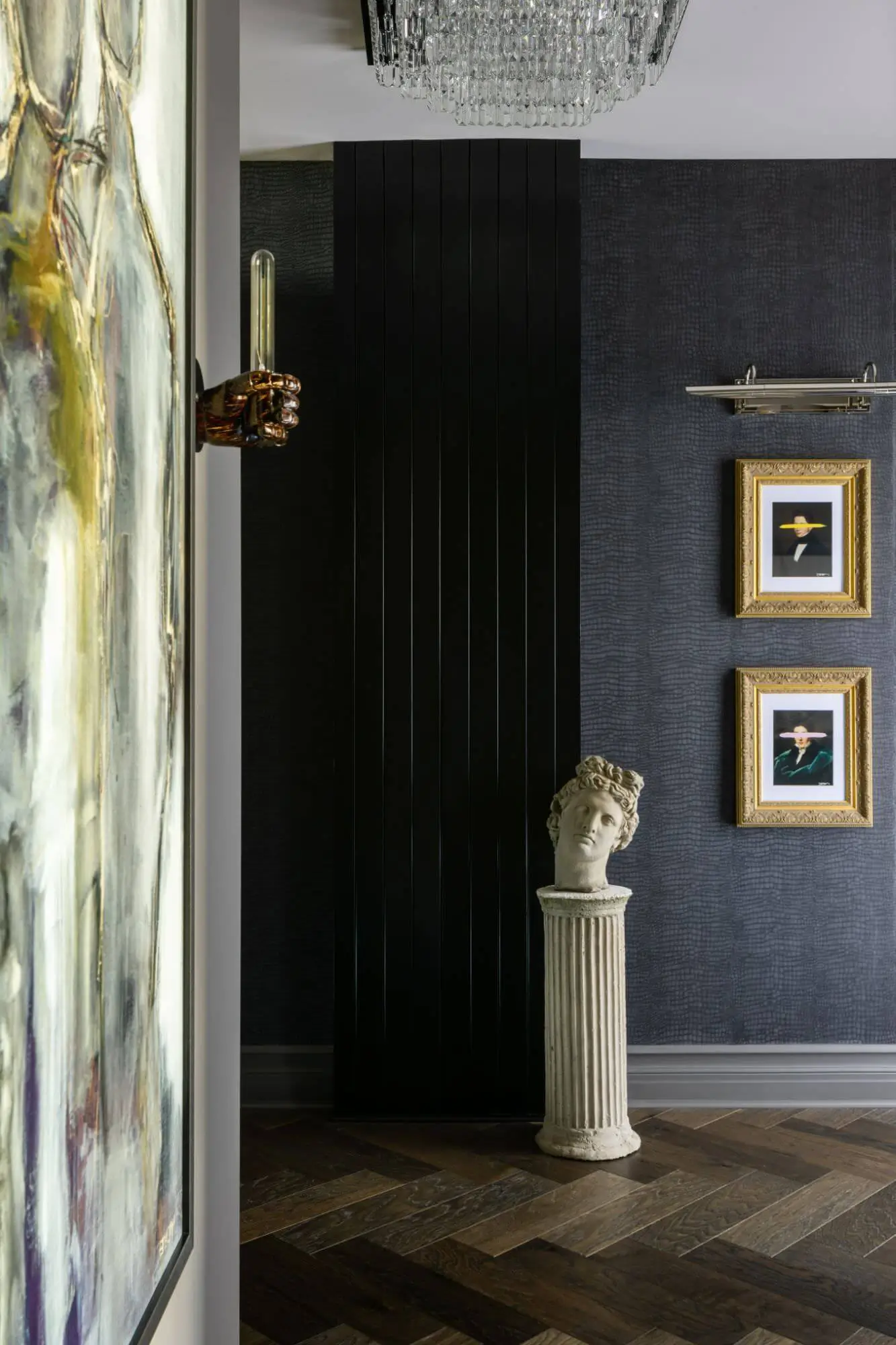dark walls with hanging photos